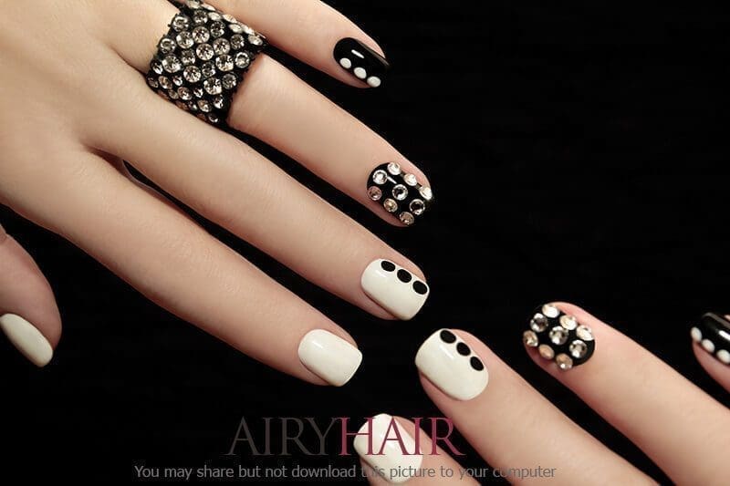 Elegant looking black and white nail art