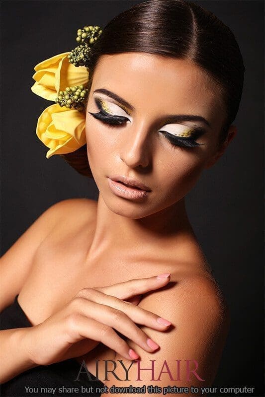 Dark brown hairstyle with yellow flowers