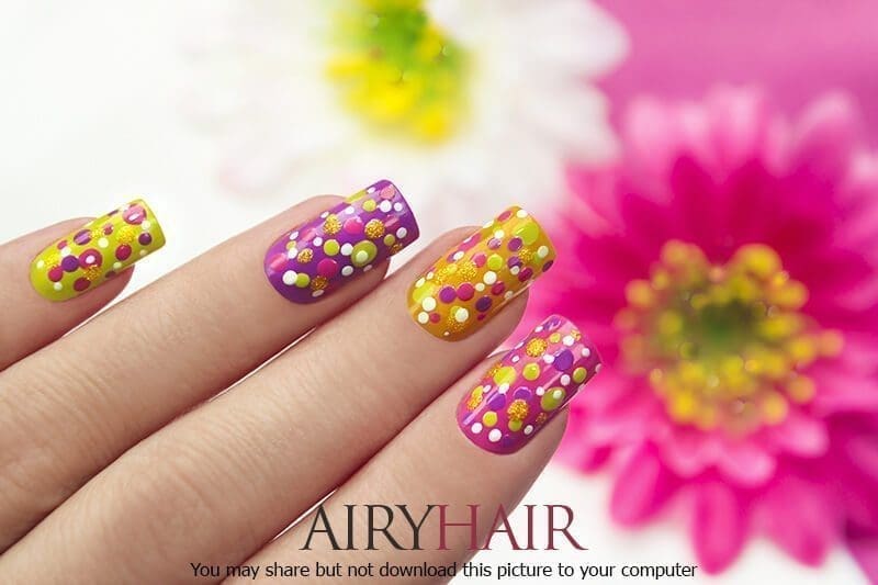 Beautiful multicoloured dots nail polish art