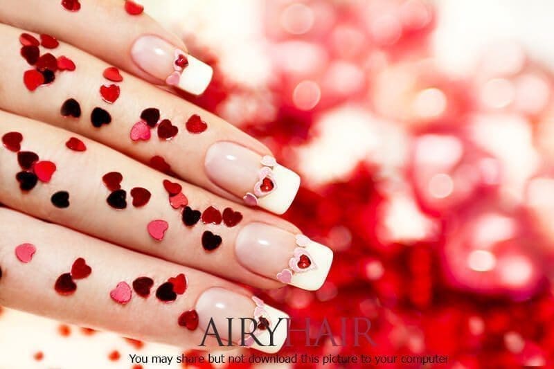 Valentine's Day special nail art design with hearts