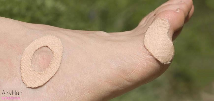 Put Moleskin on the areas that pinch your feet the most